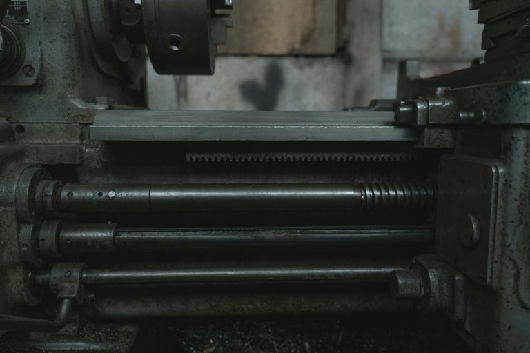 Black Metal Machine on Brown Wooden Table